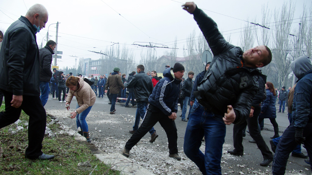 Pro-Russia protesters storm a police building in eastern Ukraine (Getty Images)