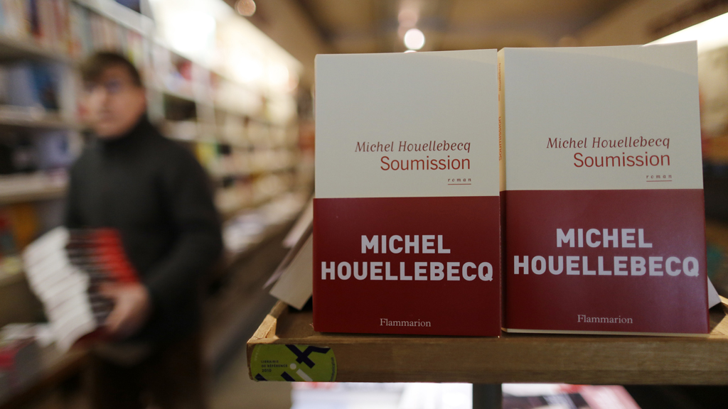 It is an unnerving coincidence: as Michel Houellebecq's controversial new novel was published on Wednesday, terrorists raided the offices of Charlie Habdo and murdered 12 people (Reuters)