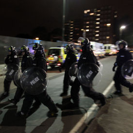 Police clash with vigilantes in Eltham (Reuters)