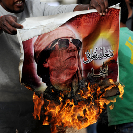 Gaddafi poster burns - Getty