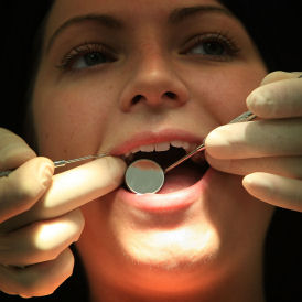 Patient undergoes dental treatment (Getty)