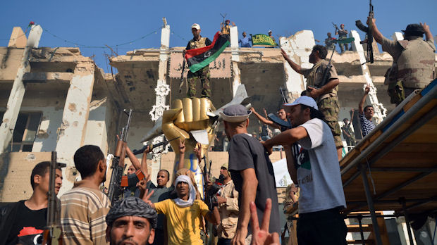 Libya rebels in Gaddafi's Bab al-Aziziya compound in Tripoli (Getty)