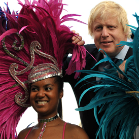 London Mayor Boris Johnson with Notting Hill carnival performers. (Getty)