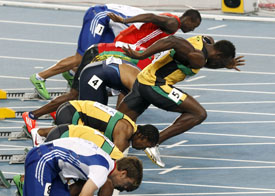 Usain Bolt of Jamaica makes a false start during the men's 100 metres final at the IAAF World Championships in Daegu