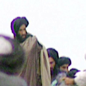 Reclusive Taliban leader Mullah Mohammed Omar seen at a Kandahar rally.
