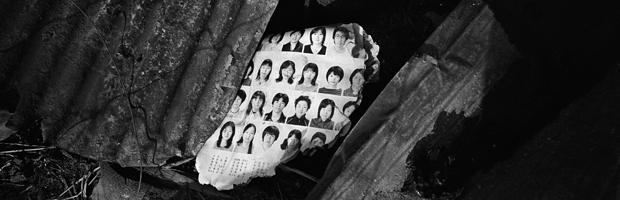 A page of a yearbook is seen among the debris at an area destroyed by the magnitude 9.0 earthquake and tsunami in Kesennuma town (Reuters)