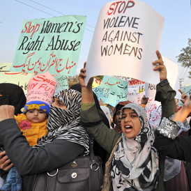 Supporters of Tehrik-e-Minhaj ul Quran, an Islamic Organisation protest against 'honour killings' of women in Lahore on November 21, 2008 (Getty)
