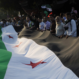 Syrian protesters call for Assad to go.