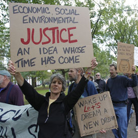 Occupy New Haven protesters march in New Haven (Reuters)