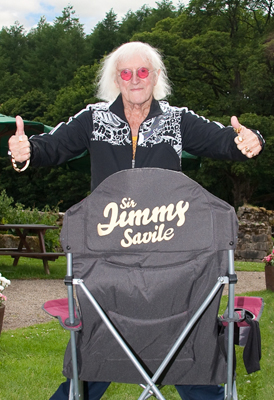 Sir Jimmy Savile in the garden of The Priests House near Bolton Abbey, North Yorkshire. (Photo: Dave Cropper)