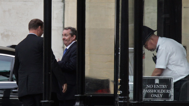 Dr Liam Fox leaves the house of commons (Getty)