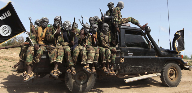 Members of al Shabaab ride in a pick-up truck outside Somalia's capital Mogadishu (Reuters)
