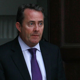 An official report is published into former defence secretary Liam Fox's links with his adviser Adam Werritty (Reuters)