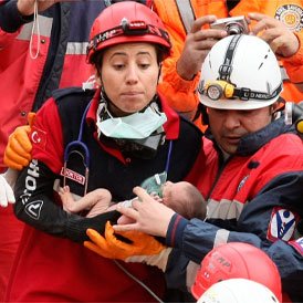 As the death toll from the Turkish earthquake rises to 432, baby Azra is pulled from the rubble in Ercis (Reuters)