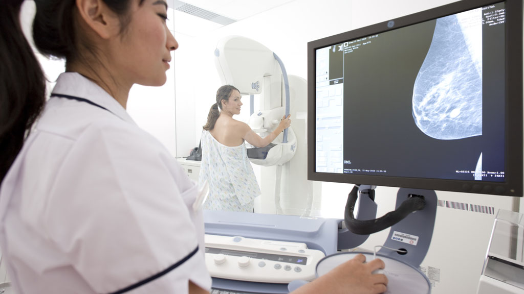 A woman undergoes a mammogram (Getty)