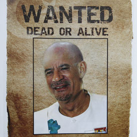 A wanted poster of Colonel Gaddafi (Reuters)