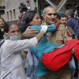 Woman injured and 10 people killed after Delhi bomb blast (Reuters)
