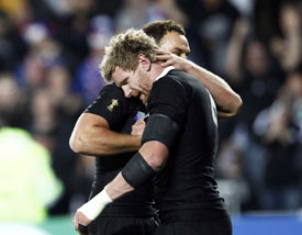 New Zealand All Blacks' Adam Thomson celebrates with Israel Dagg 