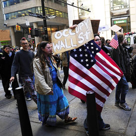 Protesters from the Occupy Wall Street campaign march in New York (Getty)