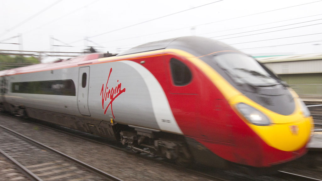 Virgin keeps hold of west coast line for another 23 months (Reuters)