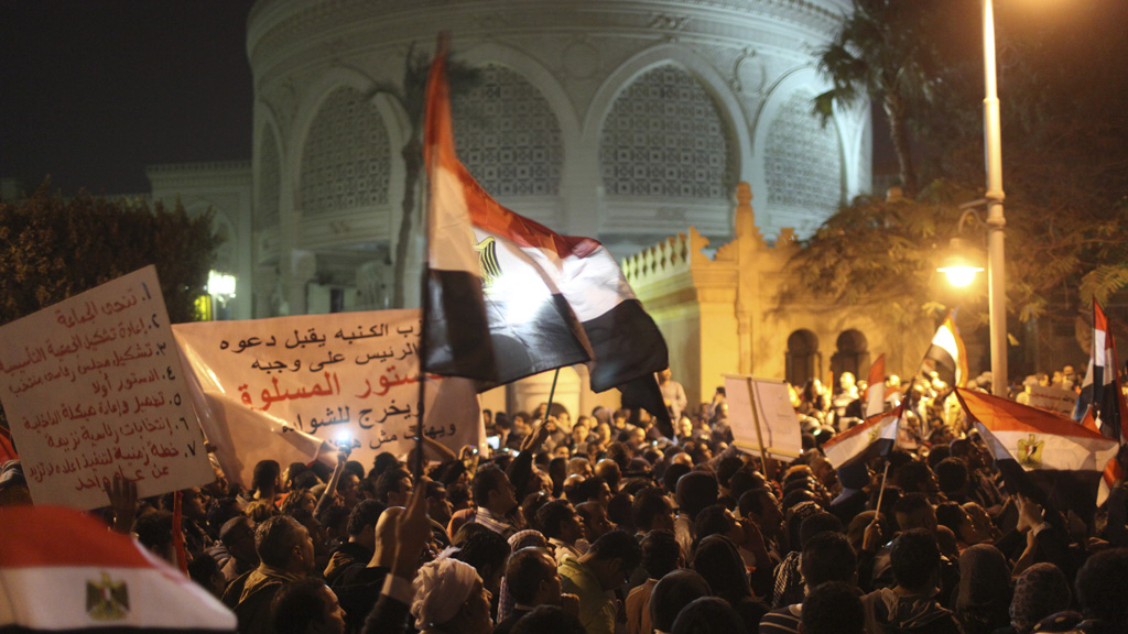 Crowds of protestors outside Egypt's presidential palace (Reuters)