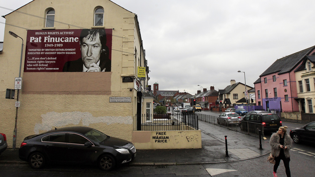 A poster of Pat Finucane on the side of a building in west Belfast. (Reuters)