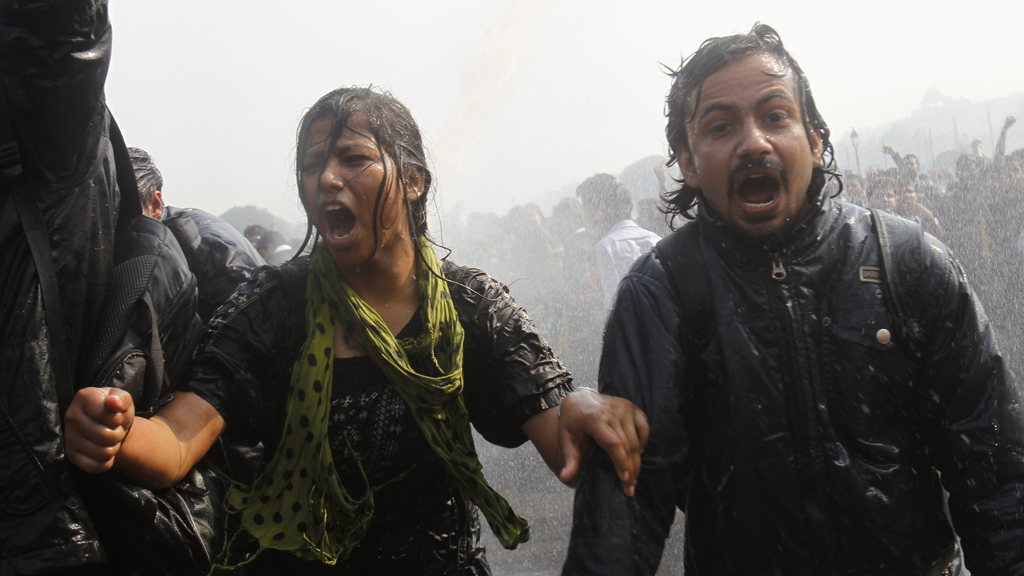 Two of the protestors at the presidential residences in New Delhi, India (Reuters)