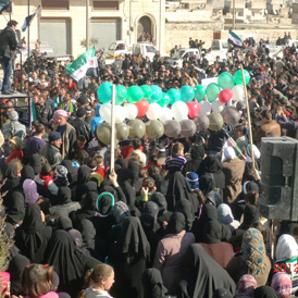 Demonstrators take part in a protest against Syria's President Bashar al-Assad in Marat al-Numan near the northern province of Idlib (Reuters)