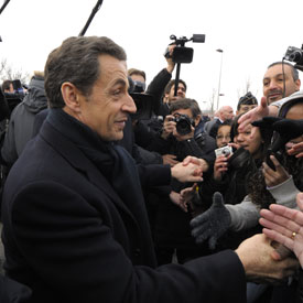 Sarkozy with supporters (Reuters)