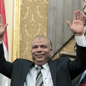 Newly elected speaker of the Egyptian parliament Katatni of the Muslim Brotherhood in the first session of the newly-elected assembly in Cairo