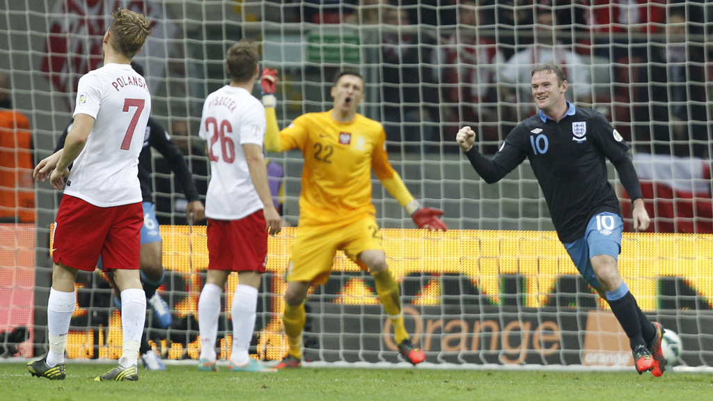 Wayne Rooney celebrates his opening goal against Poland (Reuters)