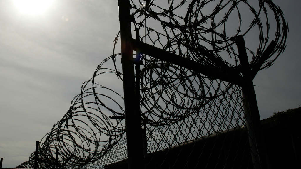 Barbed wire surrounding a prison (Reuters)