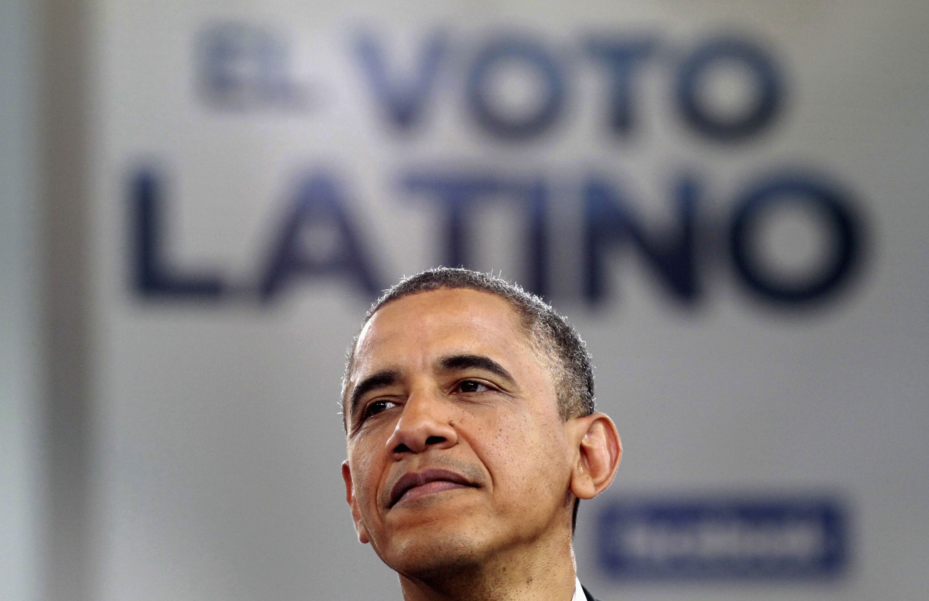 Obama with voto Latino logo (reuters)