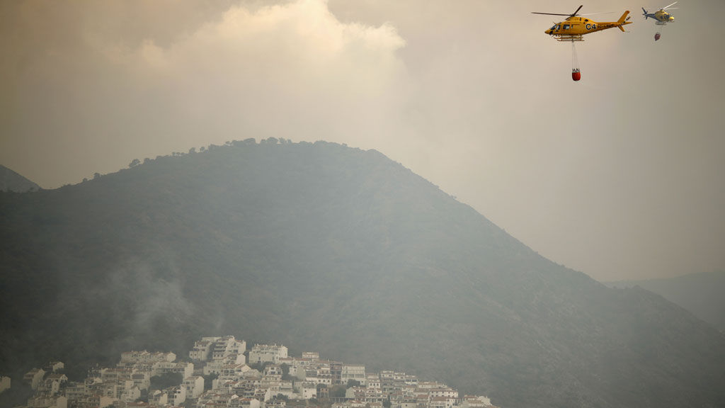 While Marbella's wildfires are under control, a new front opens up in southern Spain's Juanar area. Meanwhile there are conflicting reports about whether there are any British casualties.