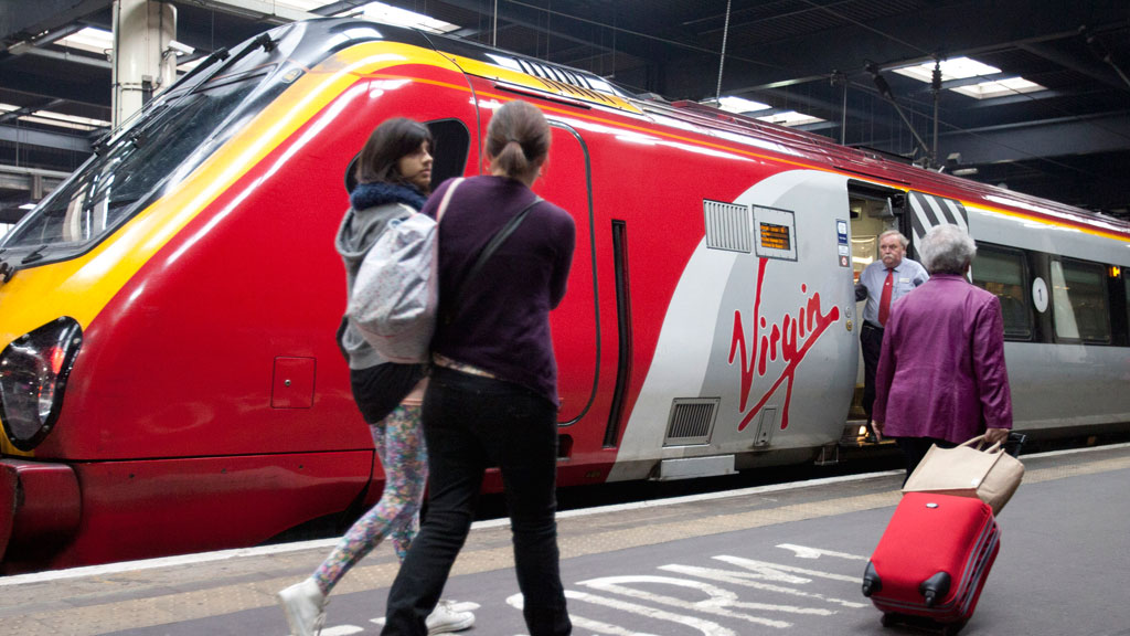Civil servant failures over the west coast rail contract will cost taxpayers tens of millions of pounds, a report by MPs reveals.