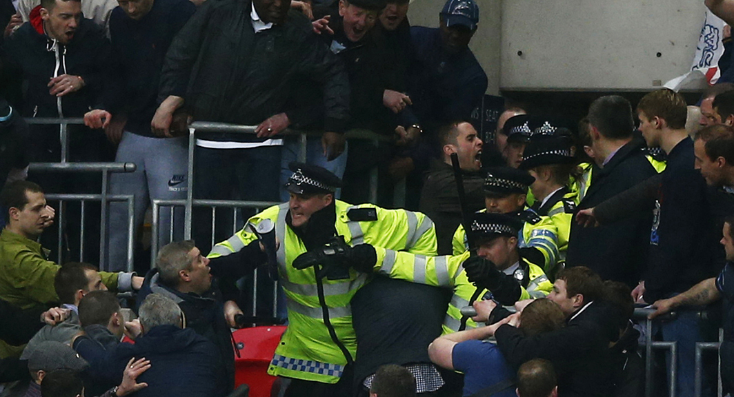Millwall fans fighting at the FA Cup semi final (Image: Reuters)
