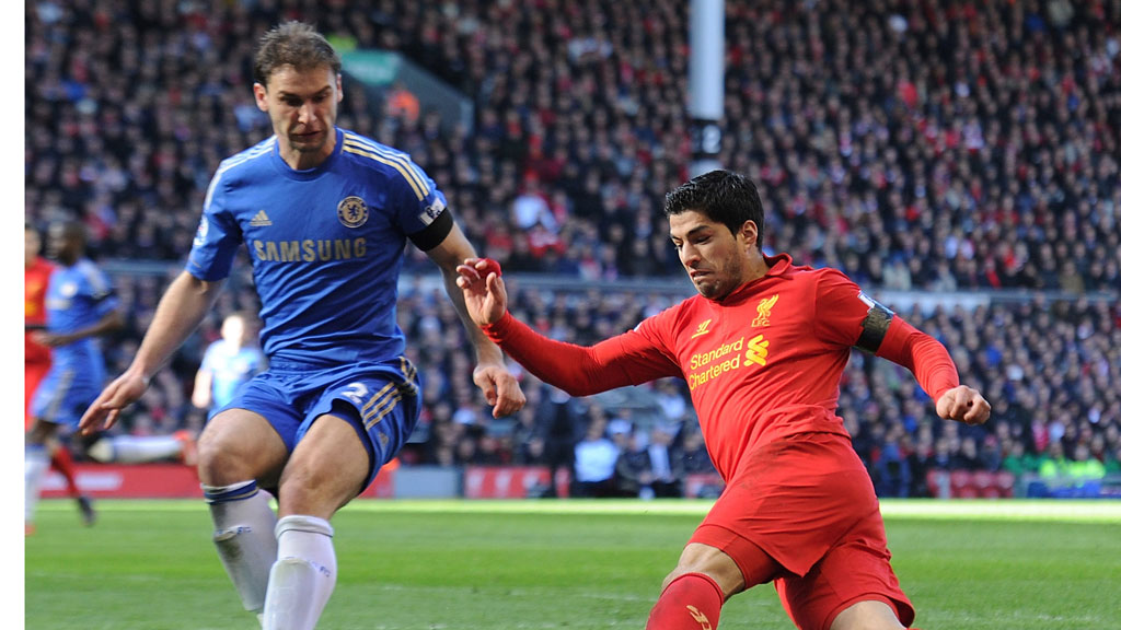 The Liverpool striker Luis Suarez is banned for ?? matches by the FA after accepting a charge of violent conduct for biting Chelsea defender Branislav Ivanovic (Getty)