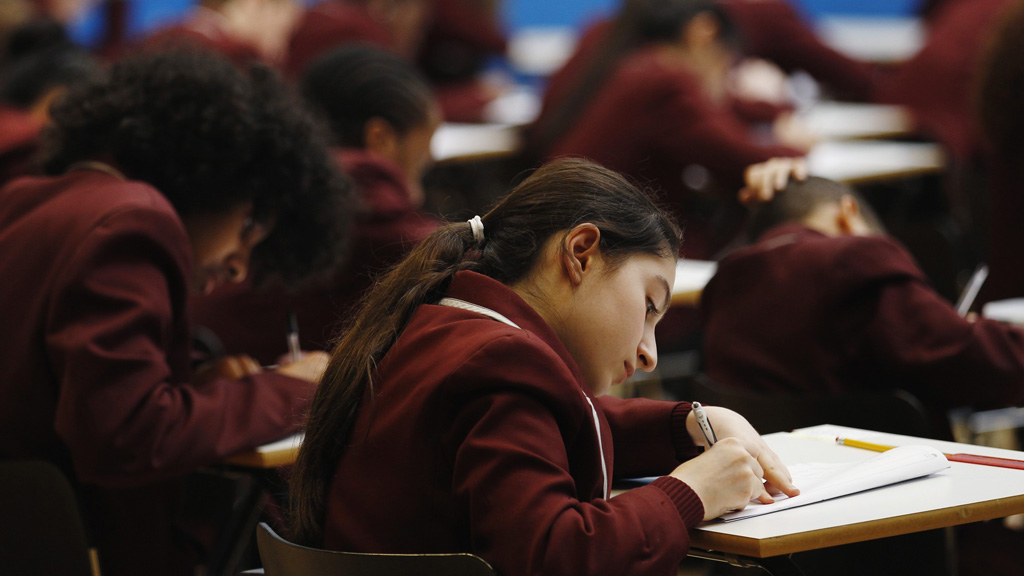 Pupils sitting GCSEs (Reuters)