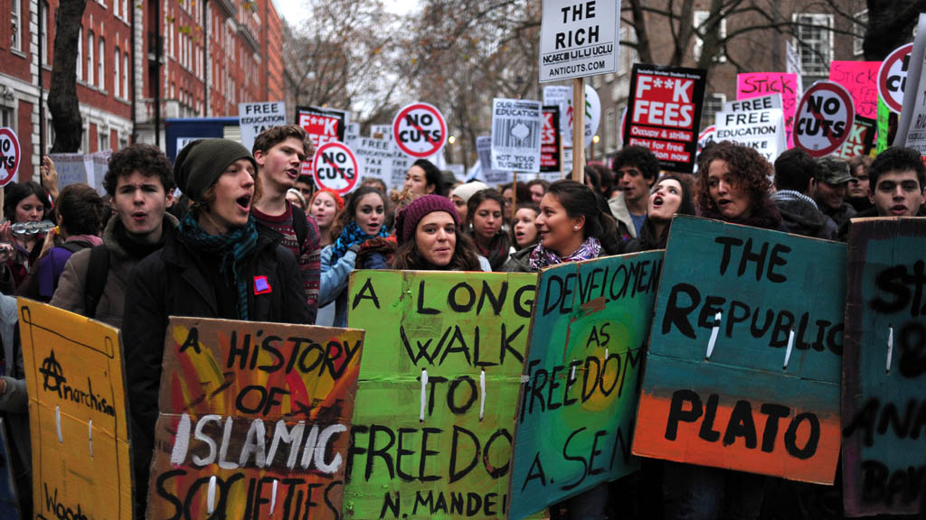 Demonstrators chant slogans during a student rally in central London on November 21, 2012 against sharp rises in university tuition fees, funding cuts and high youth unemployment.