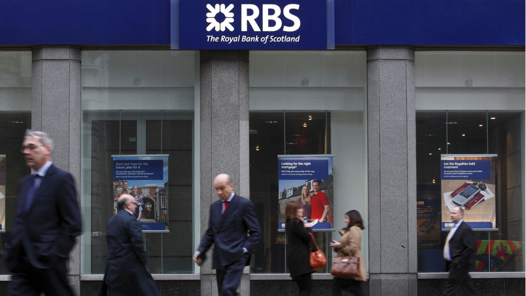 Royal Bank of Scotland is fined almost Â£400m for its role in the Libor rate-fixing scandal, the third bank forced to pay a penalty by regulators in Britain and the US (Getty)