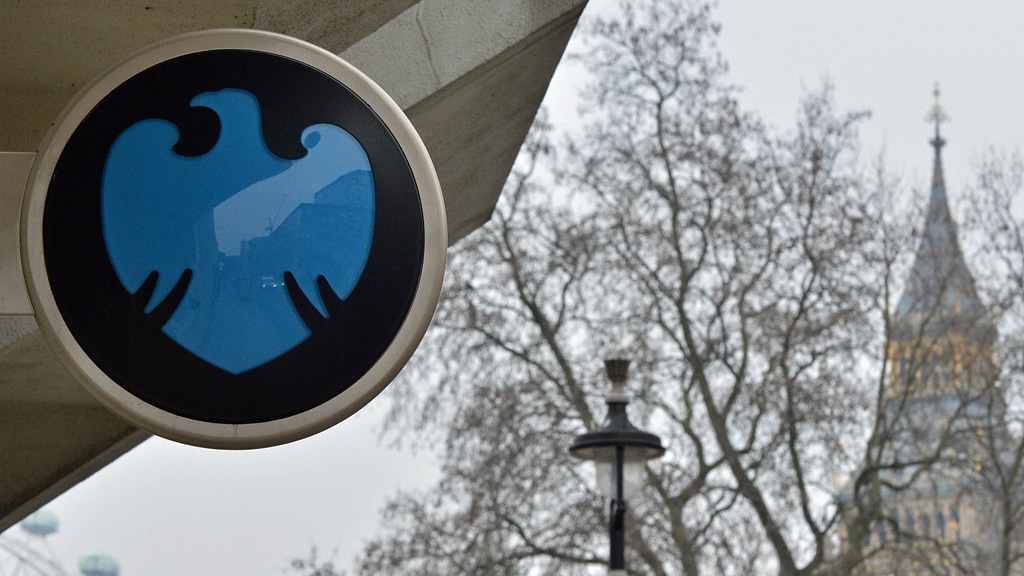 Banking giant Barclays is to cut at least 3,700 jobs under a strategic overhaul, but will pay Â£1.85bn in bonuses to its staff.