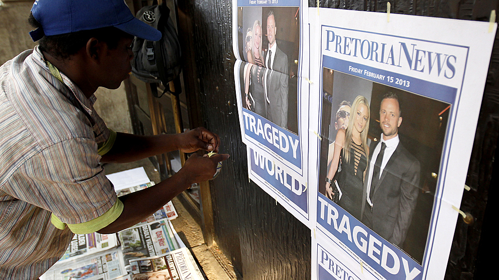 Oscar Pistorius is numb with shock says family, after being charged with the murder of his girlfriend (Image: Reuters)