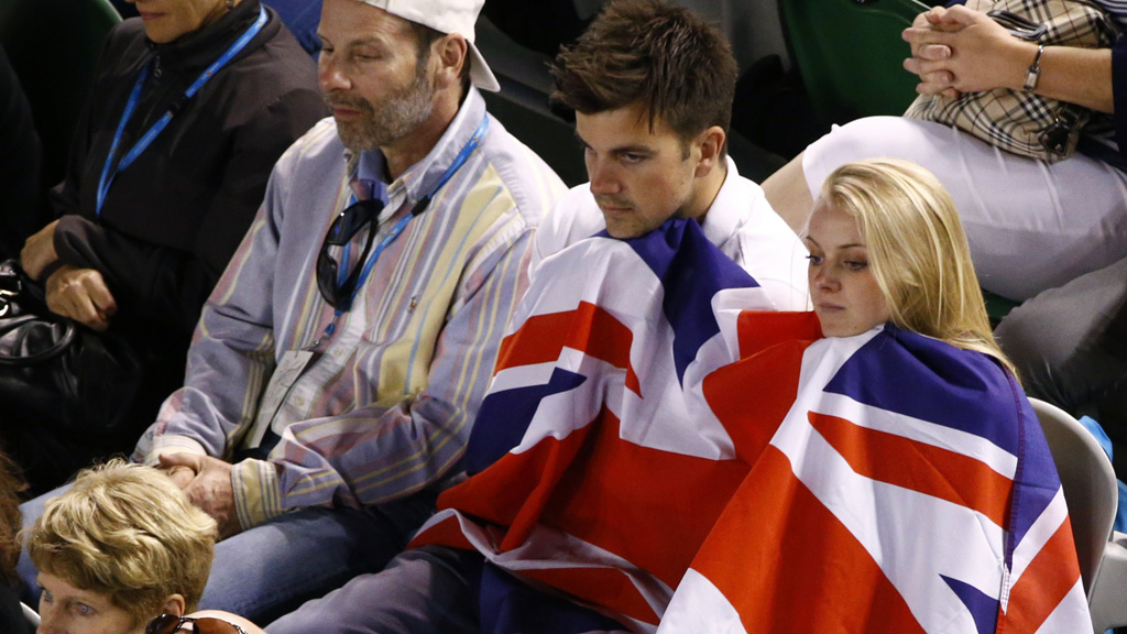 Tennis fans draped in union flags watch Andy Murray beat Roger Federer. (Reuters) 