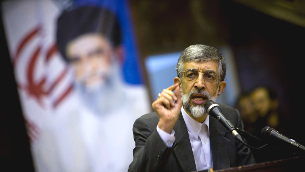 Gholam-Ali HaddadAdel, a relative of Iran's Supreme Leader Ayatollah Khamenei, drops out of the presidential race and asks his followers to vote for his hardline conservative colleagues. 