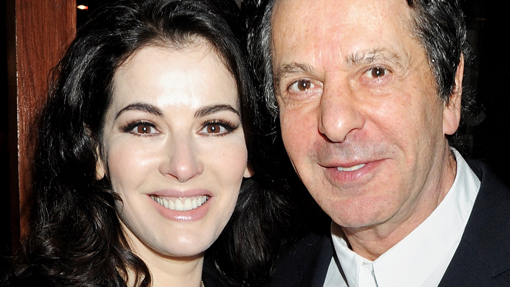 Charles Saatchi says pictures in which he appears to hold his wife Nigella Lawson by the neck were just a 'playful tiff' (picture: Getty)