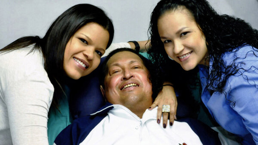 A picture released by the Venezuelan government of Hugo Chavez with his two daughters (picture: Reuters)