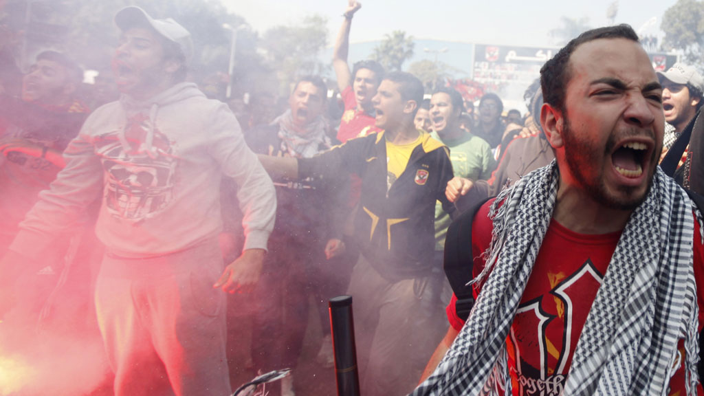 Twenty one Egyptian football fans have been sentenced to death for their role in a 2012 riot