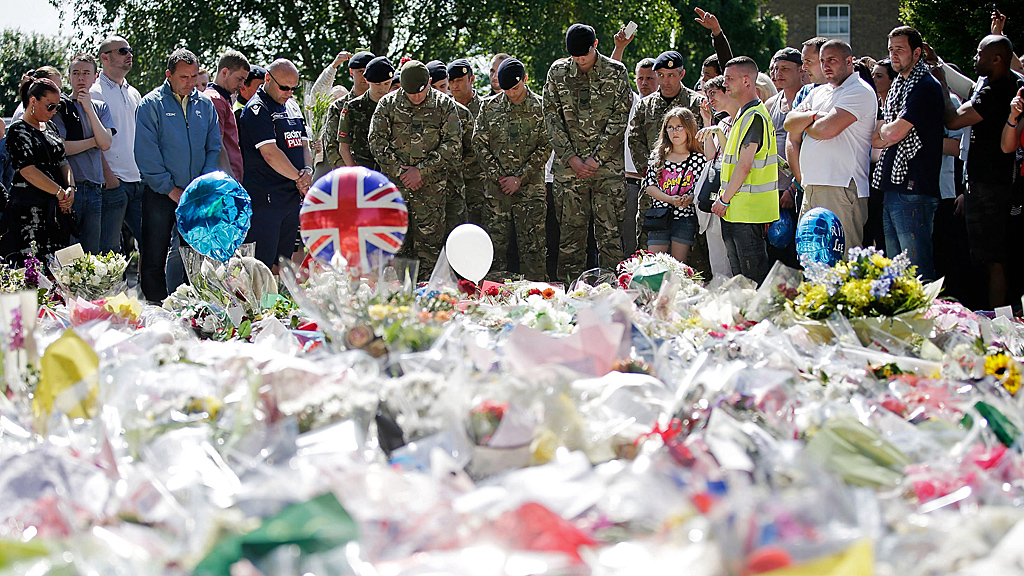 Crowds show their respects at the spot where Lee Rigby was murdered (Image: Getty)