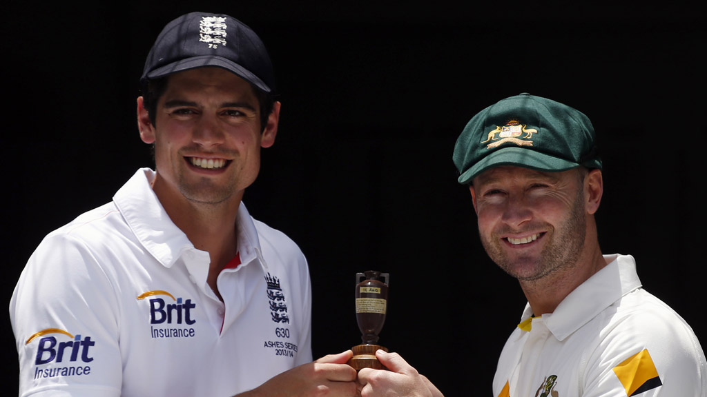 England captain Alistair Cook (left) and his Australian counterpart Michael Clarke hold a replica Ashes urn (Reuters)