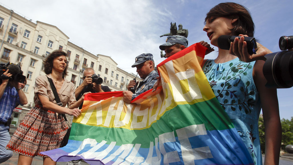 Gay rights activists take part in an opposition protest march in Moscow in June calling for Russian President Vladimir Putin's resignation and the release of activists facing long jail terms (G/R)